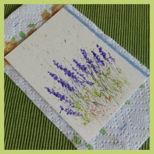 Keep your splattered paint card on a paper towel to keep it clean while you are working on it.