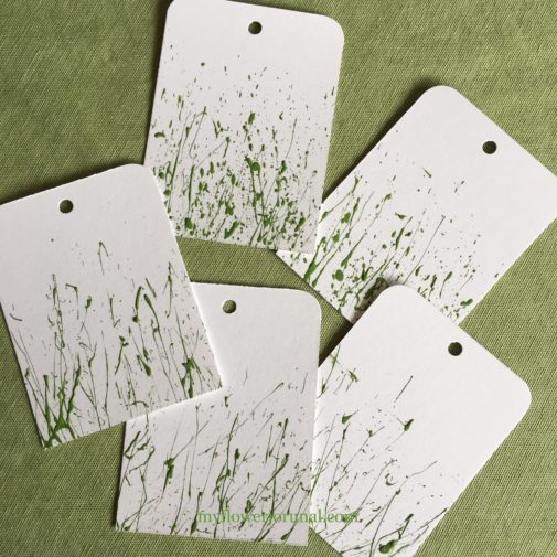 Gift tags with splatterd acrylic paint ready to add watercolor flowers from myflowerjournal.com